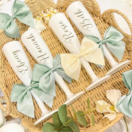 Decorative items with ribbons on a woven surface